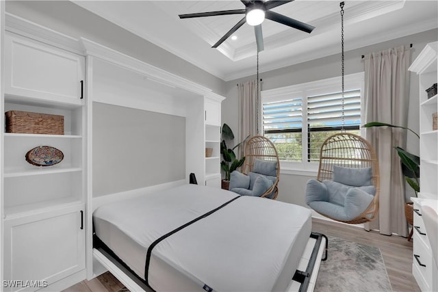 20150 Millrun Dr, Estero, FL 33928 - bedroom with crown molding, a raised ceiling, light wood-style floors, and ceiling fan