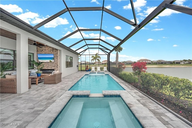 20150 Millrun Dr, Estero, FL 33928 - view of pool with a patio, an outdoor living space, ceiling fan, a pool with connected hot tub, and a lanai
