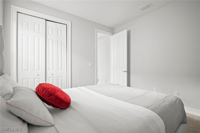 28041 Captiva Shell Loop, Bonita Springs, FL 34135 - bedroom featuring carpet floors, a closet, and baseboards