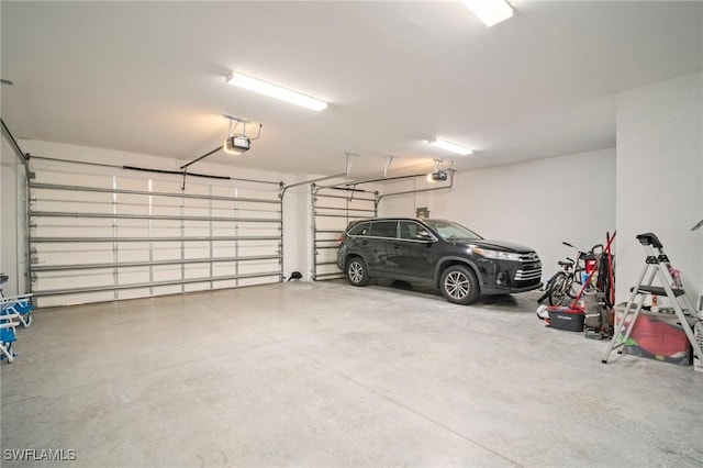 28041 Captiva Shell Loop, Bonita Springs, FL 34135 - garage with a garage door opener