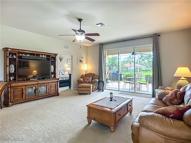 20927 Athenian Ln, North Fort Myers, FL 33917 - carpeted living room with ceiling fan