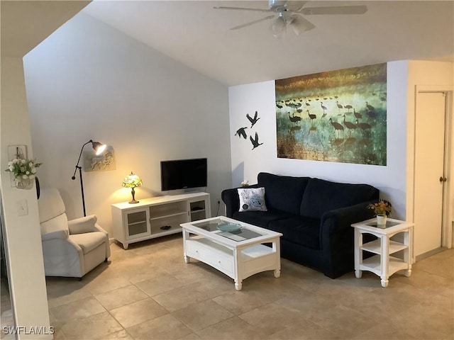 18437 Orangecrest Ct, Lehigh Acres, FL 33936 - living room with lofted ceiling, a ceiling fan, and light tile patterned floors
