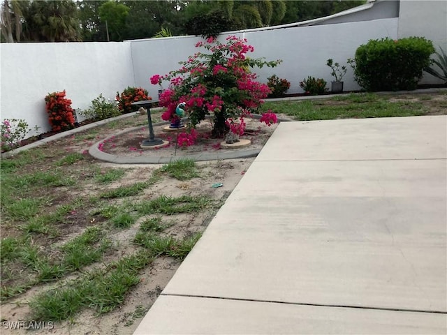 18437 Orangecrest Ct, Lehigh Acres, FL 33936 - view of yard with a patio area