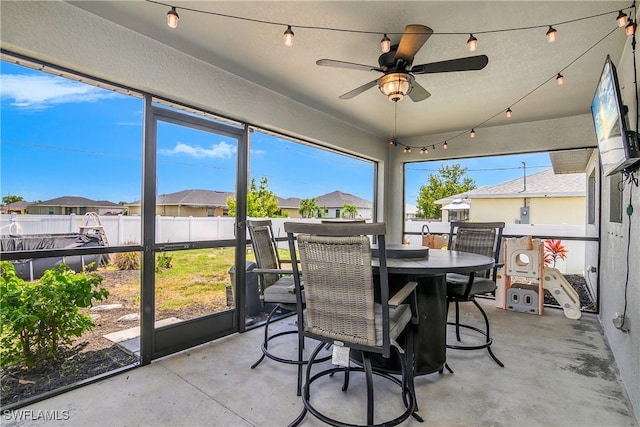 325 NE 24th Ter, Cape Coral, FL 33909 - sunroom / solarium with ceiling fan and a residential view