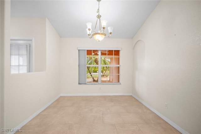 188 Ingram Blvd, Rotonda West, FL 33947 - unfurnished room featuring a chandelier and baseboards