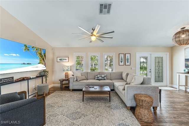 5630 Riverside Dr, Cape Coral, FL 33904 - living area with wood finished floors, baseboards, and ceiling fan