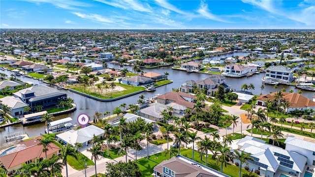 5630 Riverside Dr, Cape Coral, FL 33904 - aerial perspective of suburban area with a large body of water