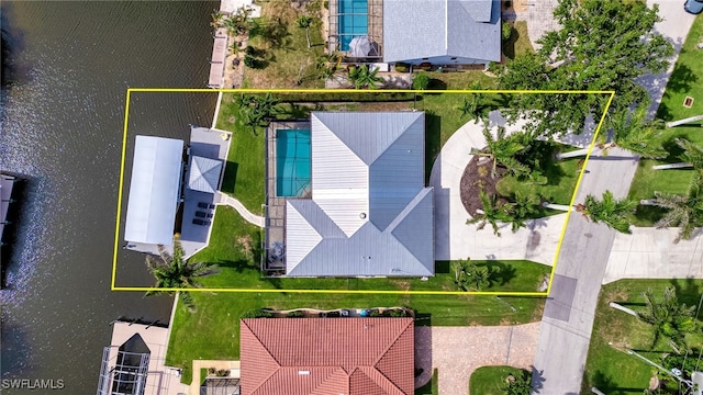 5630 Riverside Dr, Cape Coral, FL 33904 - aerial view of property's location featuring a pool and property parcel outlined