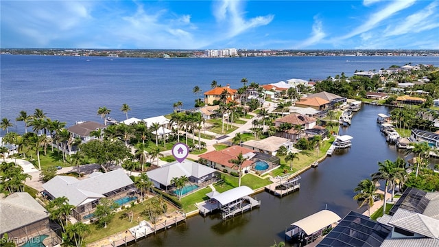 5630 Riverside Dr, Cape Coral, FL 33904 - aerial perspective of suburban area featuring a nearby body of water