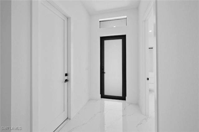 928 NE 8th Place, Cape Coral, FL 33909 - doorway to outside with marble tiled flooring