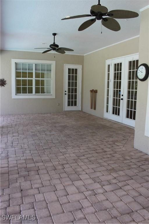 4150 Enclave Pl, Punta Gorda, FL 33980 - view of patio / terrace with ceiling fan and french doors