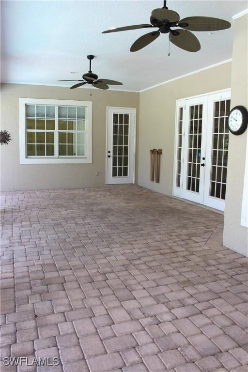 4150 Enclave Pl, Punta Gorda, FL 33980 - view of patio featuring ceiling fan and french doors