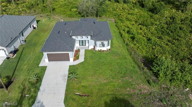 570 Sherwood Ave S, Lehigh Acres, FL 33974 - aerial view of property and surrounding area