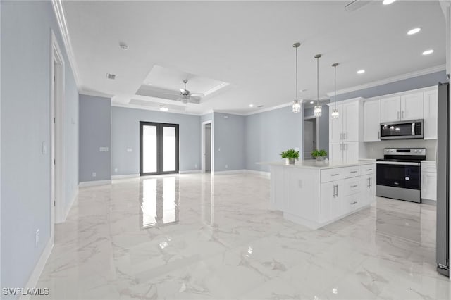 570 Sherwood Ave S, Lehigh Acres, FL 33974 - kitchen with appliances with stainless steel finishes, crown molding, baseboards, recessed lighting, and open floor plan