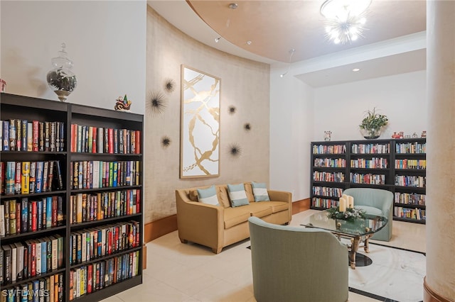 2080 W 1st St Unit 206, Fort Myers, FL 33901 - living area featuring wall of books and tile patterned flooring