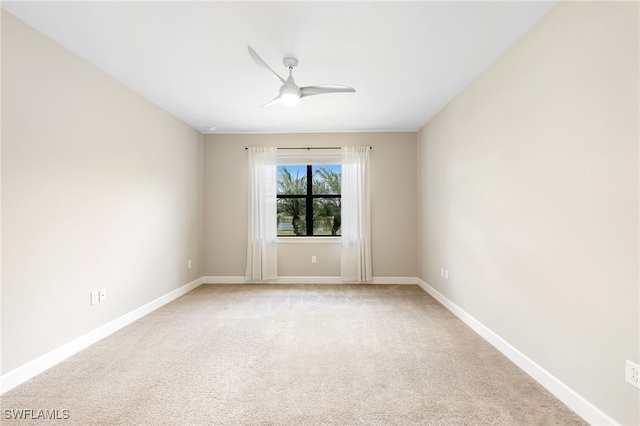 17021 Ashcomb Way, Estero, FL 33928 - empty room featuring a ceiling fan and light colored carpet