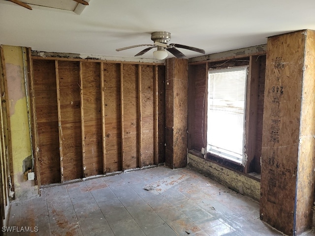 137 Standish Cir, North Fort Myers, FL 33903 - empty room with healthy amount of natural light and a ceiling fan