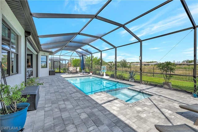 11693 Canopy Loop, Fort Myers, FL 33913 - view of swimming pool featuring a patio, a pool with connected hot tub, and glass enclosure