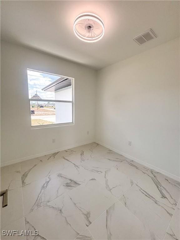 4113 19th St SW, Lehigh Acres, FL 33976 - empty room with baseboards