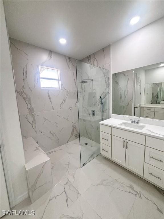 3806 15th St W, Lehigh Acres, FL 33971 - bathroom featuring a marble finish shower, marble finish flooring, vanity, and recessed lighting