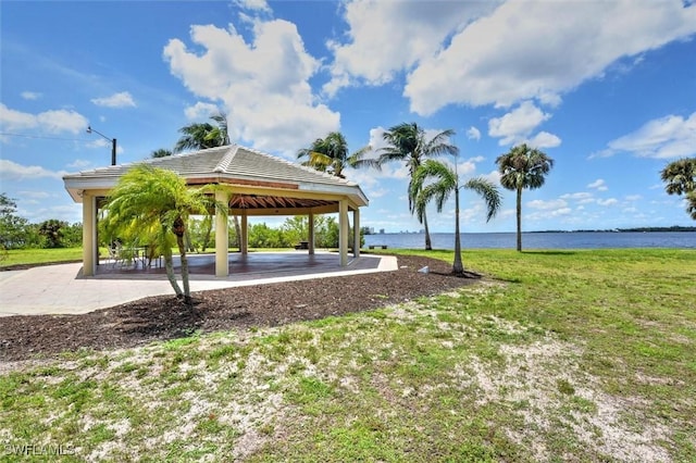 1704 Coral Way N, Fort Myers, FL 33917 - surrounding community with a gazebo, a water view, and a yard