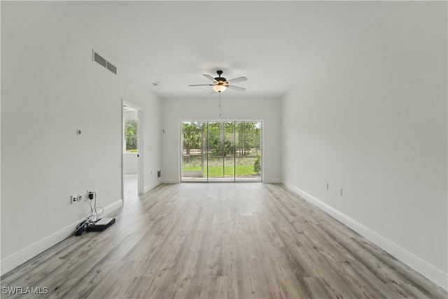 411 Valerie Way Unit 103, Naples, FL 34104 - spare room featuring light wood-style flooring and a ceiling fan