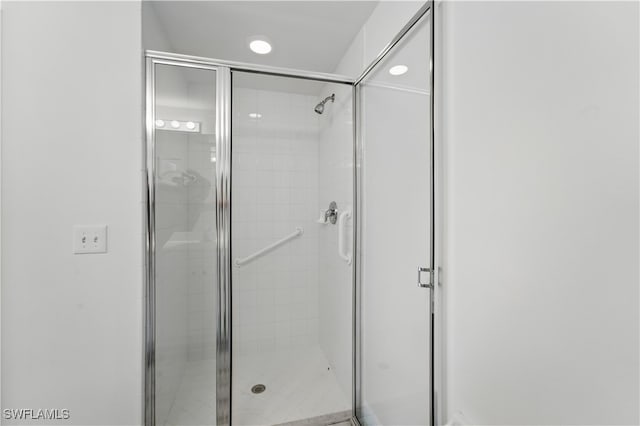 411 Valerie Way Unit 103, Naples, FL 34104 - full bathroom with a shower stall