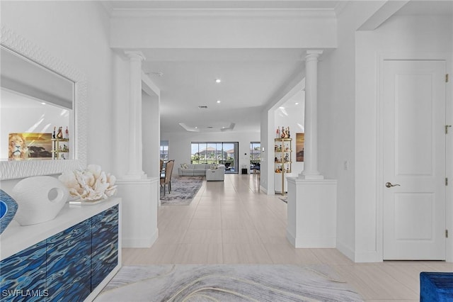 8341 Promoso Ct, Naples, FL 34114 - hall with decorative columns, recessed lighting, and tile patterned flooring