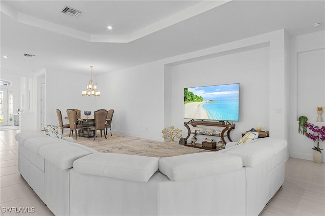 8341 Promoso Ct, Naples, FL 34114 - living area with a chandelier, recessed lighting, and light tile patterned floors