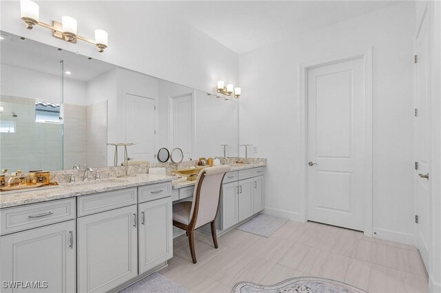 8341 Promoso Ct, Naples, FL 34114 - full bathroom featuring double vanity and a tile shower