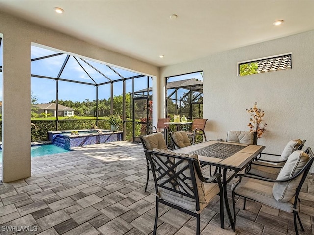 8341 Promoso Ct, Naples, FL 34114 - view of patio / terrace with outdoor dining area, a pool with connected hot tub, and glass enclosure