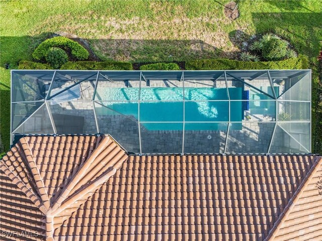 8341 Promoso Ct, Naples, FL 34114 - view of pool with a lanai
