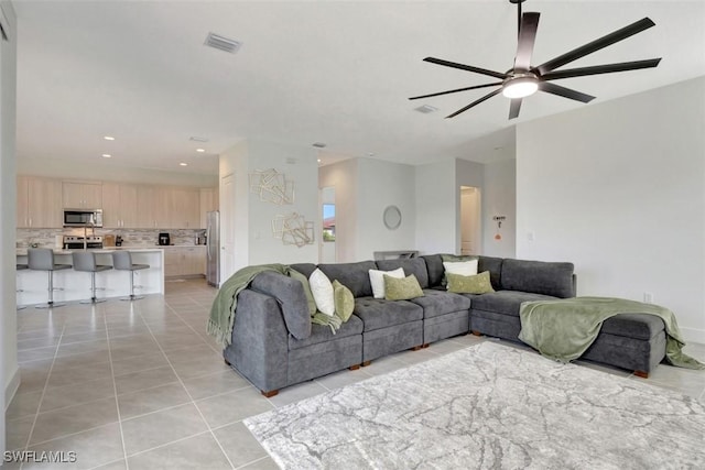 5273 Lamone Ln, Ave Maria, FL 34142 - living room with light tile patterned floors, ceiling fan, and recessed lighting