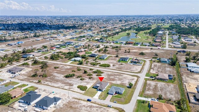 2458 NW 21st Ter, Cape Coral, FL 33993 - aerial view of property and surrounding area with a nearby body of water and nearby suburban area