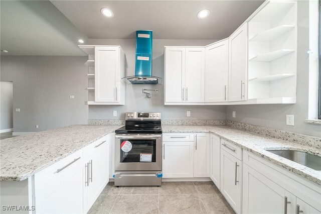 2458 NW 21st Ter, Cape Coral, FL 33993 - kitchen featuring open shelves, stainless steel range with electric cooktop, range hood, a peninsula, and white cabinetry