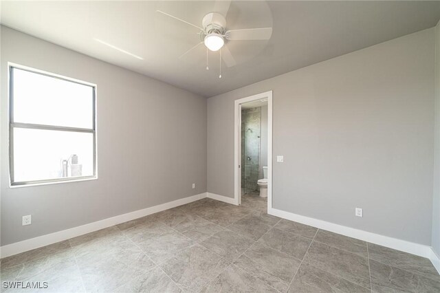 2458 NW 21st Ter, Cape Coral, FL 33993 - spare room with ceiling fan and baseboards