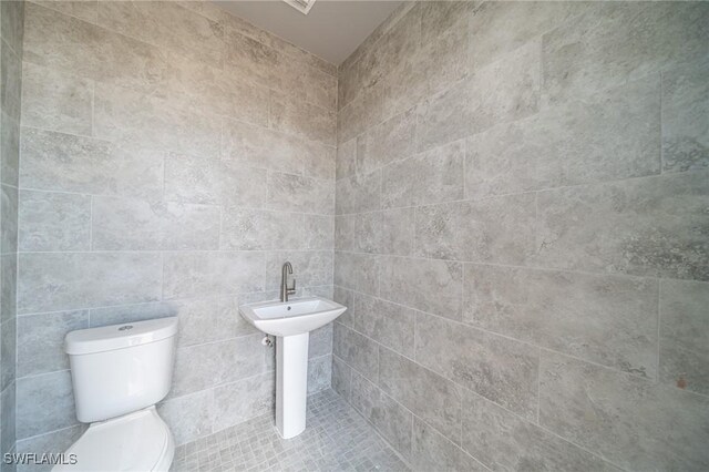 2458 NW 21st Ter, Cape Coral, FL 33993 - bathroom with toilet and a sink