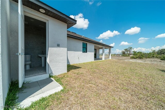 2458 NW 21st Ter, Cape Coral, FL 33993 - view of green lawn