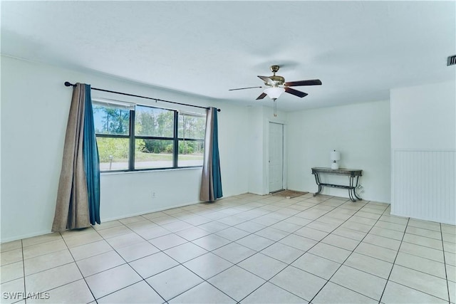 1201 E 15th St, Lehigh Acres, FL 33972 - spare room with ceiling fan and light tile patterned flooring