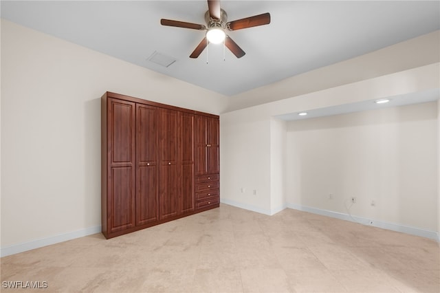 14221 Patty Berg Dr, Fort Myers, FL 33919 - unfurnished bedroom featuring baseboards and ceiling fan