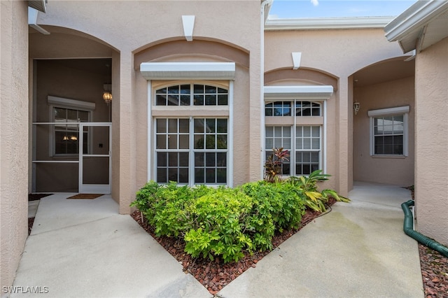 14221 Patty Berg Dr, Fort Myers, FL 33919 - entrance to property featuring stucco siding