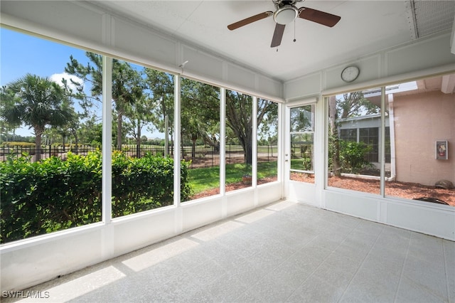 14221 Patty Berg Dr, Fort Myers, FL 33919 - unfurnished sunroom with ceiling fan and healthy amount of natural light