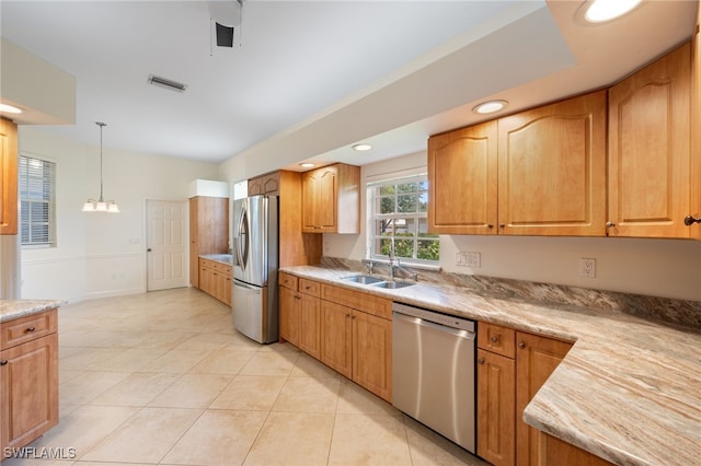 14221 Patty Berg Dr, Fort Myers, FL 33919 - kitchen with appliances with stainless steel finishes, light tile patterned flooring, hanging light fixtures, a chandelier, and recessed lighting