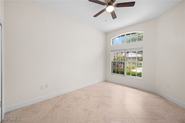 14221 Patty Berg Dr, Fort Myers, FL 33919 - spare room featuring ceiling fan, baseboards, and light tile patterned floors