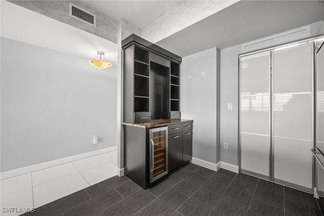 3000 Oasis Grand Blvd Unit 2103, Fort Myers, FL 33916 - indoor bar with beverage cooler and baseboards