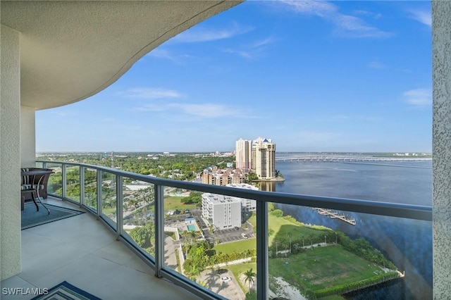 3000 Oasis Grand Blvd Unit 2103, Fort Myers, FL 33916 - balcony featuring a water view and a city view
