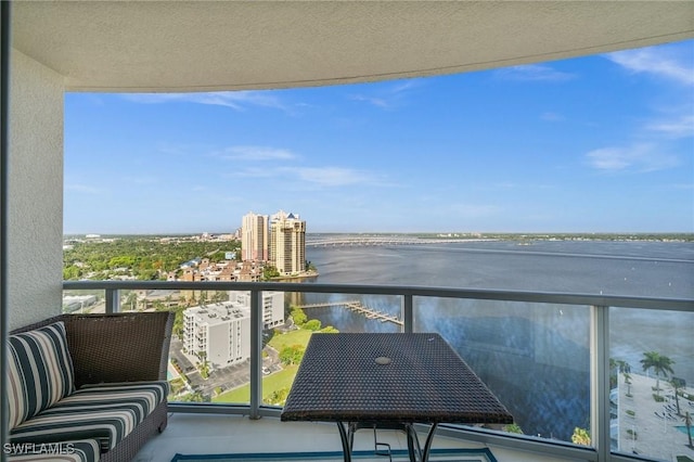 3000 Oasis Grand Blvd Unit 2103, Fort Myers, FL 33916 - balcony with a water view and a city view