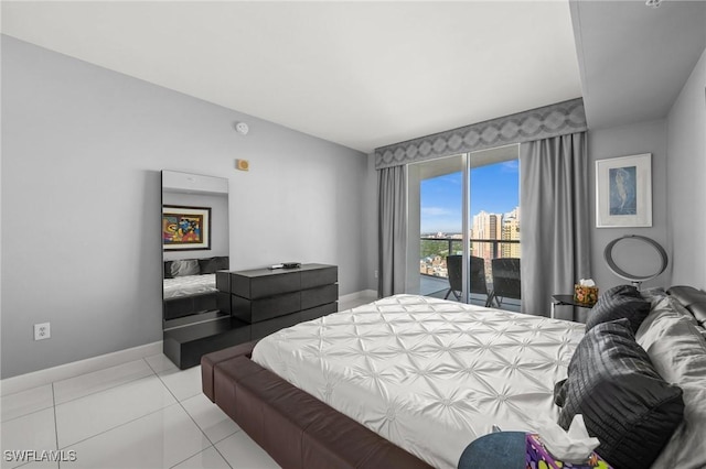 3000 Oasis Grand Blvd Unit 2103, Fort Myers, FL 33916 - tiled bedroom with baseboards