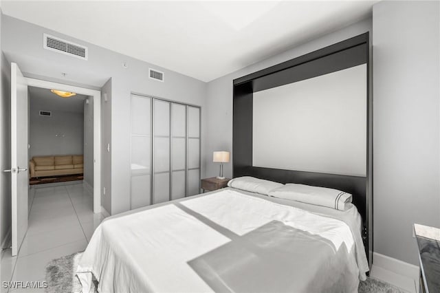 3000 Oasis Grand Blvd Unit 2103, Fort Myers, FL 33916 - bedroom with a closet and tile patterned floors