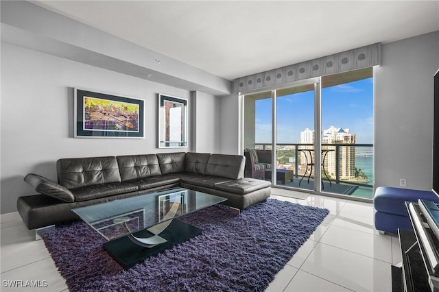 3000 Oasis Grand Blvd Unit 2103, Fort Myers, FL 33916 - living room featuring tile patterned floors